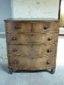 Victorian flame mahogany bow fronted chest of two over three graduated drawers raised on turned