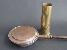 Brass shall case dated 1905 and a warming pan