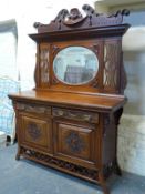 Art Nouveau mirror back sideboard with shell finial,
