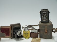 Ensign Selpix 1620 camera and a Voigtlander Brilliant camera,