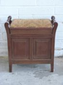 A 19thC walnut pianola or organ stool