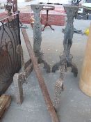 A large pair of 19thC wrought and cast iron fire dogs,