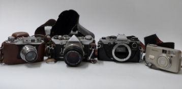 Quantity of cameras to include Olympus OM1 with 1:1.