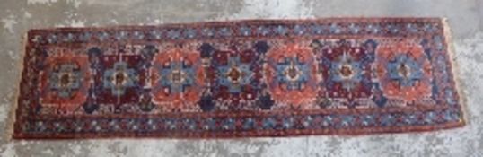Turkoman woollen rug or runner with pink guls,