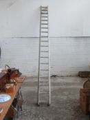 Two aluminium extending ladders, each section approximately 4.