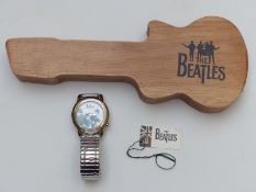 Beatles watch on elasticated metal strap, copyright 1993,