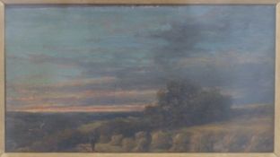 A 19thC oil on board, traveller walking through a harvested cornfield, in ornate gilt frame,