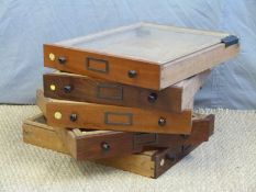 Five display drawers with mahogany fronts and ebony handles, ex British Museum,