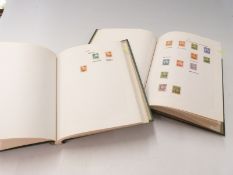 A collection of stamps from China in two Senator albums from early coiling dragons to 1950's