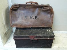 Leather Gladstone bag and a metal deed box