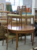 G-Plan style circular table with additional fold out leaf,