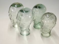 Four glass busts for shopfitting/ display purposes