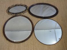 Four mirrors including two bevelled examples,