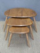 Retro Ercol light elm nest of pebble tables,
