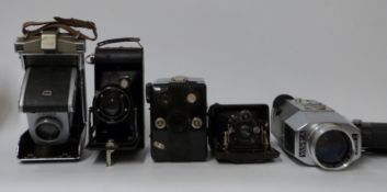 A quantity of collectable cameras including a small Ica Atom folding camera, Yashica camera,