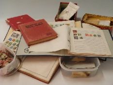 A large quantity of all-world stamps, loose and in albums,