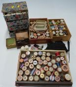 A large quantity of needlework related items including mother of pearl cotton reels,