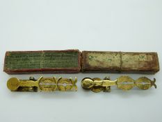 Two boxed Victorian rocker sovereign scales, one marked Harrison the other marked W.