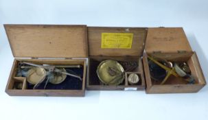 Three cased sets of travelling beam scales,