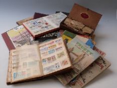 Two boxes of all world stamp albums