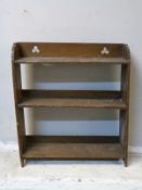 A small Art Nouveau oak bookcase,