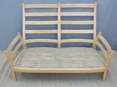 Ercol two-seater settee in light elm