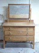 Oak three drawer dressing chest with mirror to back,