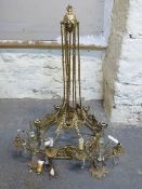 A brass six branch chandelier,