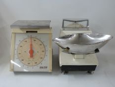 Four various sets of scales including Salters model 184 with parcel rates shown,