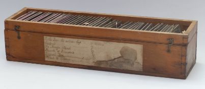 Approximately fifty vintage coloured Magic Lantern storybook or educational slides in wooden box