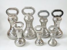 Two runs of chrome bell weights 7lb downwards