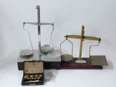 A postage or similar scale and a set of Avery laboratory scales