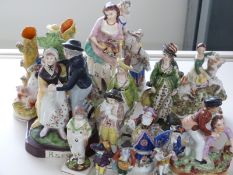 A collection of 19th / 20thC ceramics including Staffordshire figures of boys fighting,