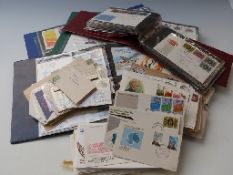 GB first day cover albums and a quantity of loose all-world covers