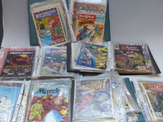 A large collection of vintage action comics in folders and binders including DC