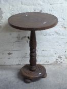 Circular occasional table with turned support,