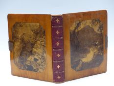 A Victorian album of photographs of Scotland covers made from Birnam Wood,