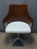 A retro style plywood and chrome adjustable swivel chair