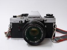Olympus OM10 SLR camera with f=50mm 1:1,