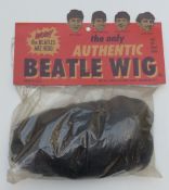 Beatles 'The Only Authentic Beatle Wig' fits all head sizes,