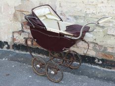 Leeway vintage dolls pram in brown with hood and cover,
