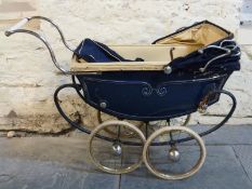Pedigree vintage dolls pram in blue with hood and cover,