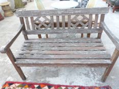 A teak garden bench,