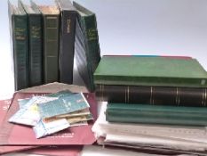 Five albums of first day covers and a box of unused albums,