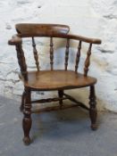 An elm seated captain's chair