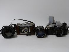 Olympus OM10 SLR camera with 50mm 1:1.8 lens, Miranda 70-210mm 1:4.5-5.6 and 35-70mm 1:3.5-4.