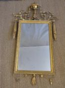 Regency gilt wood mirror with swags and urn finial and pediment decoration,