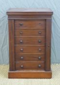 An apprentice or miniature mahogany Wellington chest of six drawers,