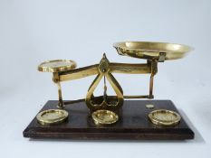 19thC set of brass postage scales with weights to base,