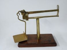 Brass cantilever postage scale with sliding weight